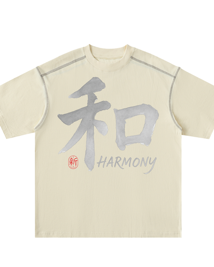 Shinsei Harmony oversized tee in apricot, front: brush-stroke 和 with HARMONY script and red 新 seal