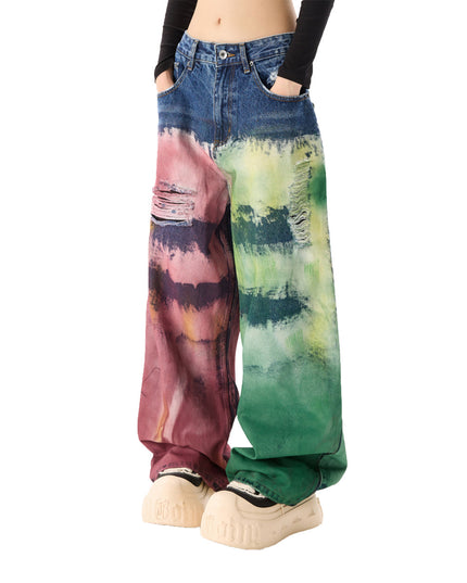 Color-splatter wide-leg jeans on model, three-quarter view