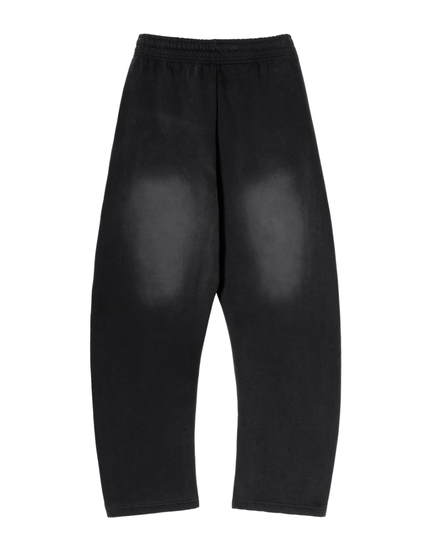 Back of the sunfade sweatpants showing the faded seat and curved leg