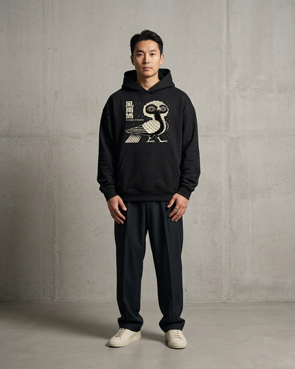 Model wearing the black Shinsei Storm Pigeon hoodie