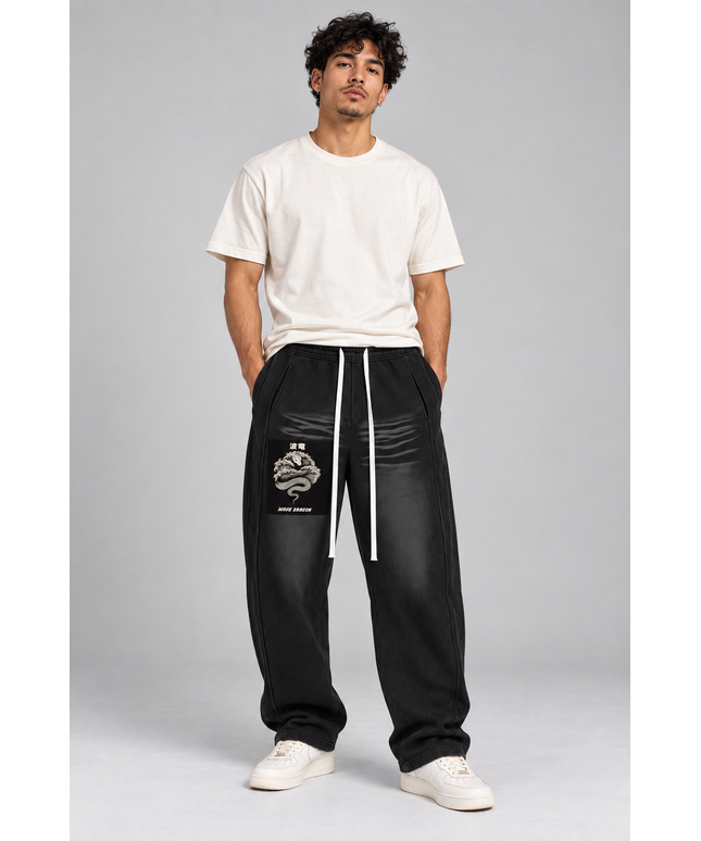Model wearing the Kanji Dragon sunfade sweatpants