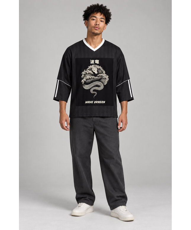 Model wearing the black Wave Dragon jersey in a studio